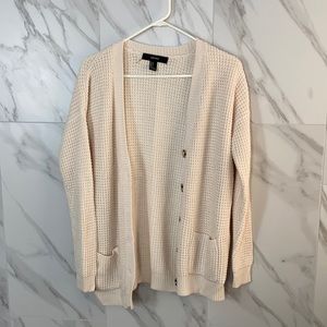 pink knit cardigan